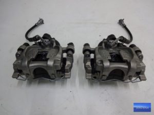 Zacisk zaciski tył str.lewa  NOWY VW GOLF VII