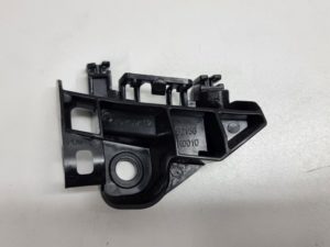 Toyota Yaris ślizg zderzaka lewy tył 52156-K0010