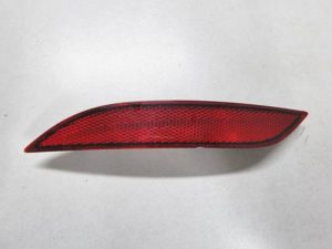 Audi A3 odblask zderzaka lewy 8V0945105