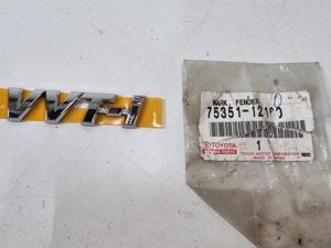 Emblemat toyota corolla VVT-I 75351-12160