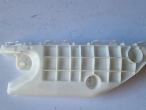 Toyota Verso-s ślizg zderzaka lewy 52536-52070