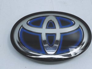 Toyota Corolla Yaris emblemat znaczek pod radar przód 90975-02124